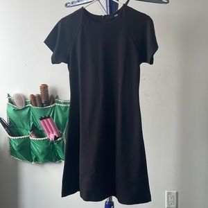 Uniqlo plain black crew neck dress. Worn a few times. Size S.